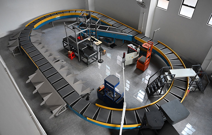 環(huán)型交叉帶分揀機(jī)的工作原理、特點(diǎn)及應(yīng)用